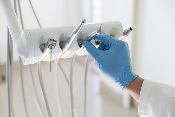 Professional Emergency Dentist technician working in Watford City, ND